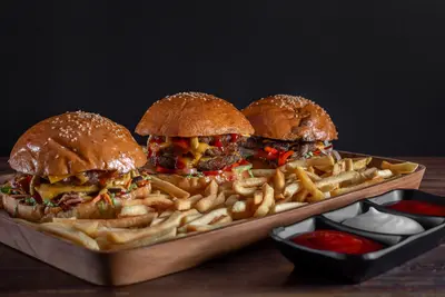 Trio of Hamburgers with fries