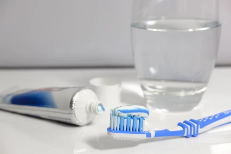 Tap water and toothpaste with fluoride