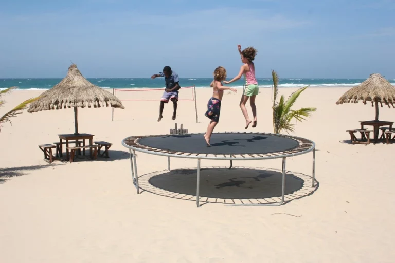 children bouncing on trampoline