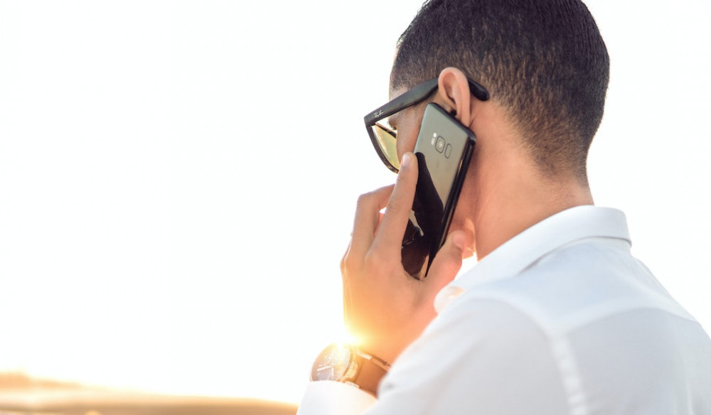 Image of a man talking by phone