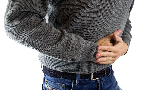 Image of a man with stomach pain