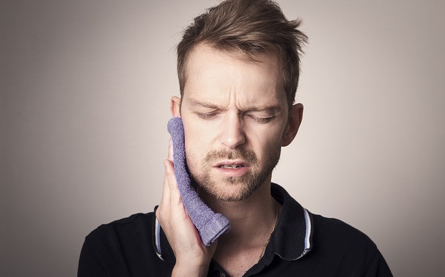 Image of a man with teeth pain