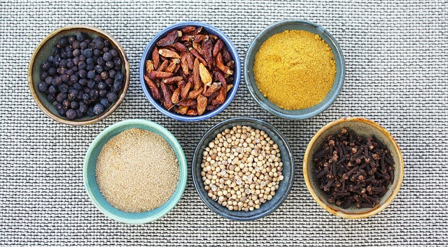 Image of some spices in bowls including cloves