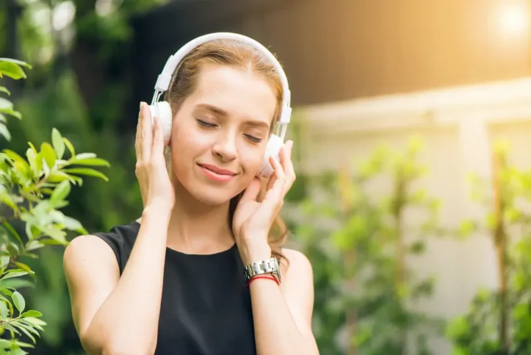 Image of a woman listening to music