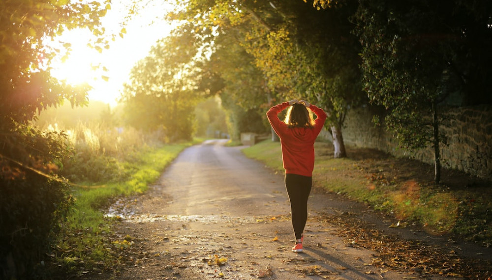 Image of a healthy woman walking outside