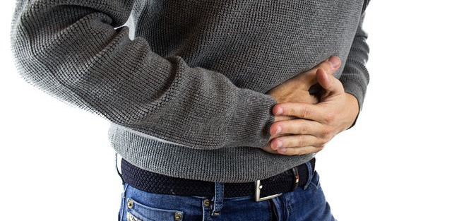 Image of a man with stomach pain