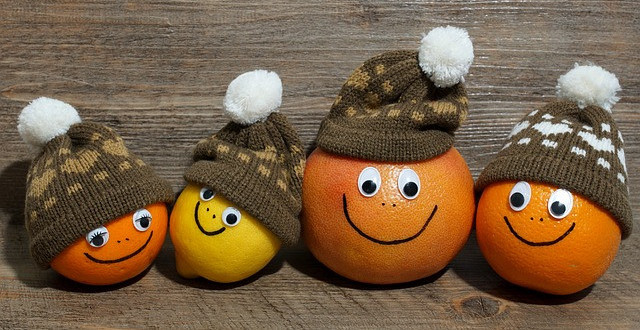 Image of oranges with a happy face